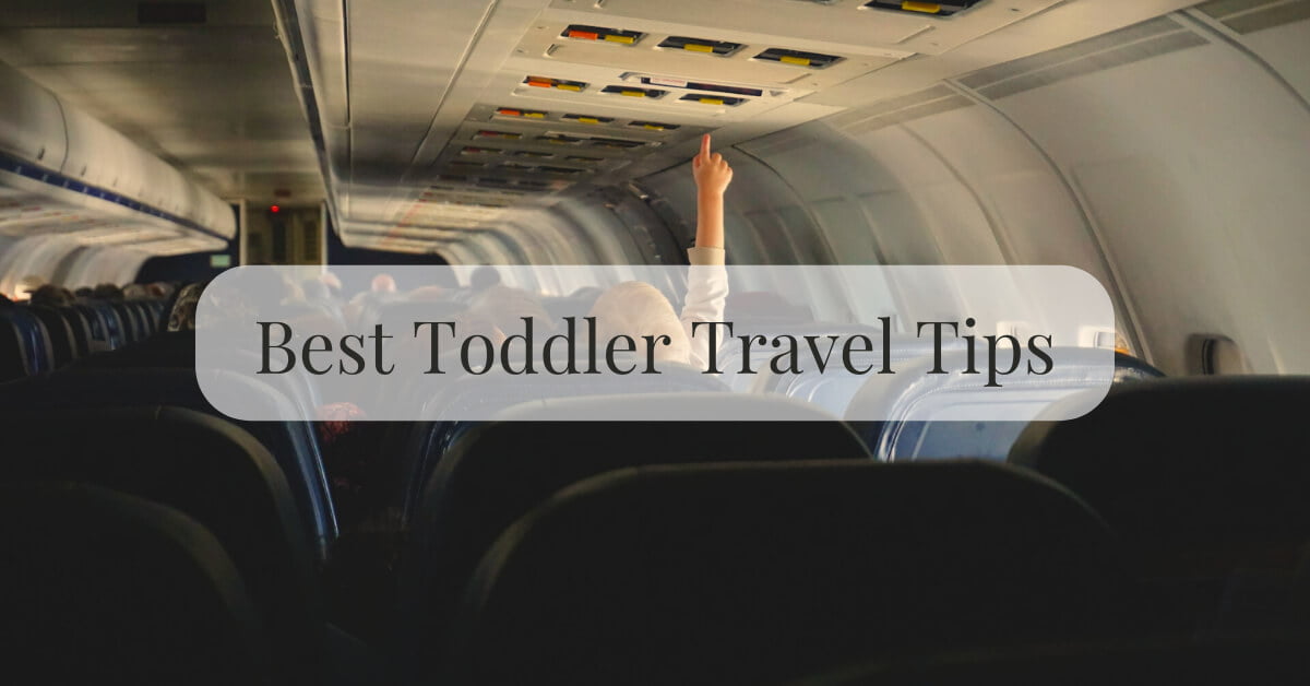 Toddler pressing button on a plane